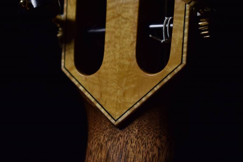 Figured Maple binding with black purfling 