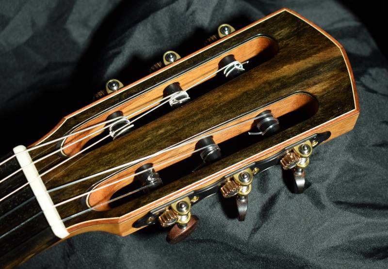 Ebony head veneer trimmed with bloodwood