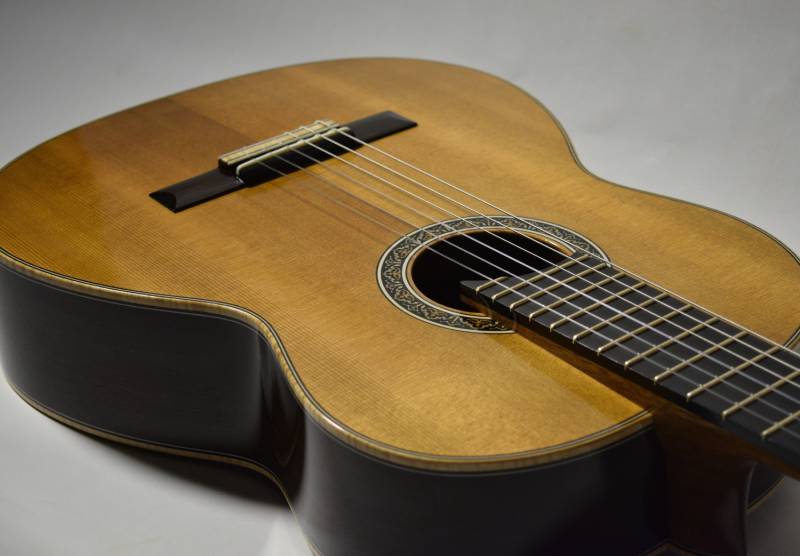 A dark western red cedar soundboard