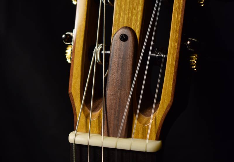 Truss rod is accessible easily without loosening the strings