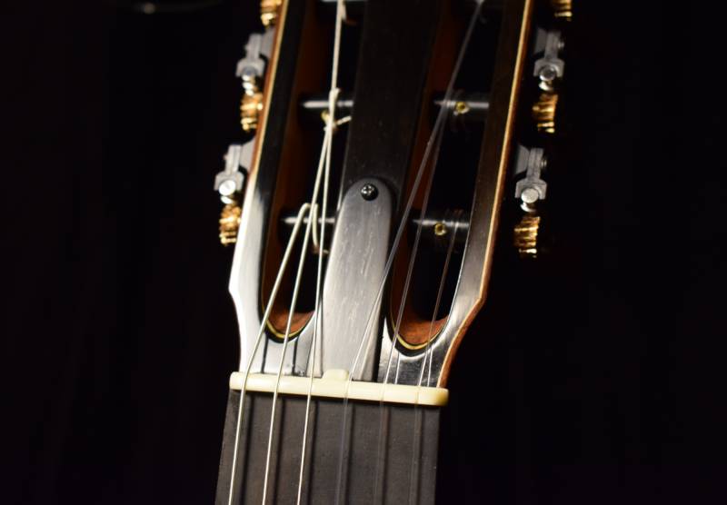 Adjustable, two way truss rod accessible at the headstock