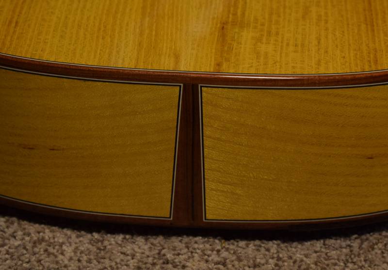 Pau Ferro binding with a black/white purfling contrasts nicely with the Osage orange
